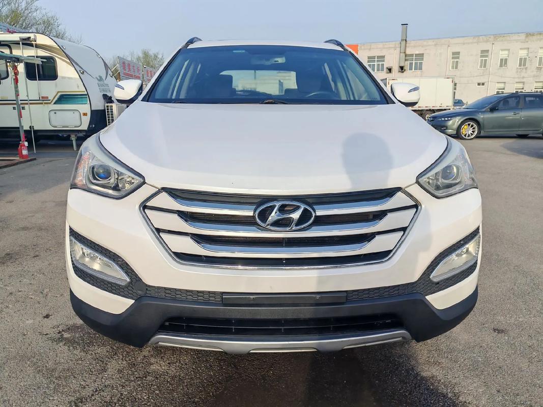 【2013款现代新胜达报价及图片,13年的现代新胜达能卖多少钱?】